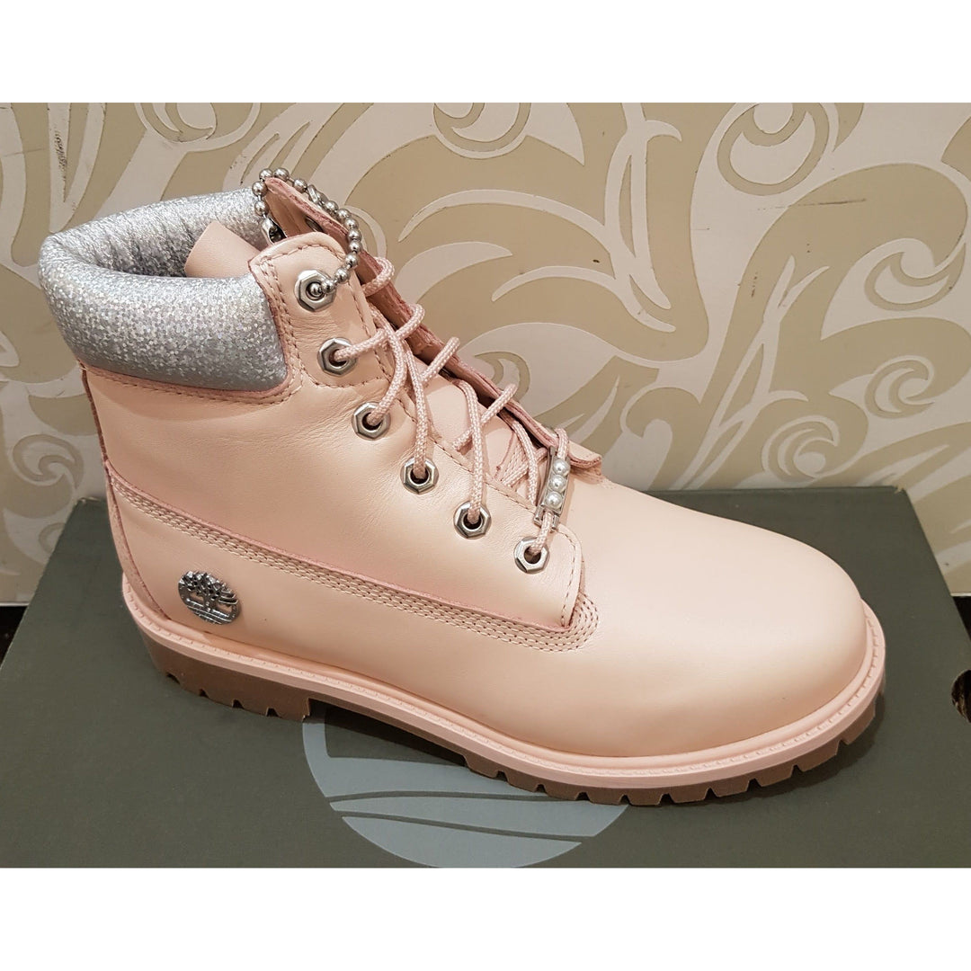 Dusty pink timberland boots hotsell